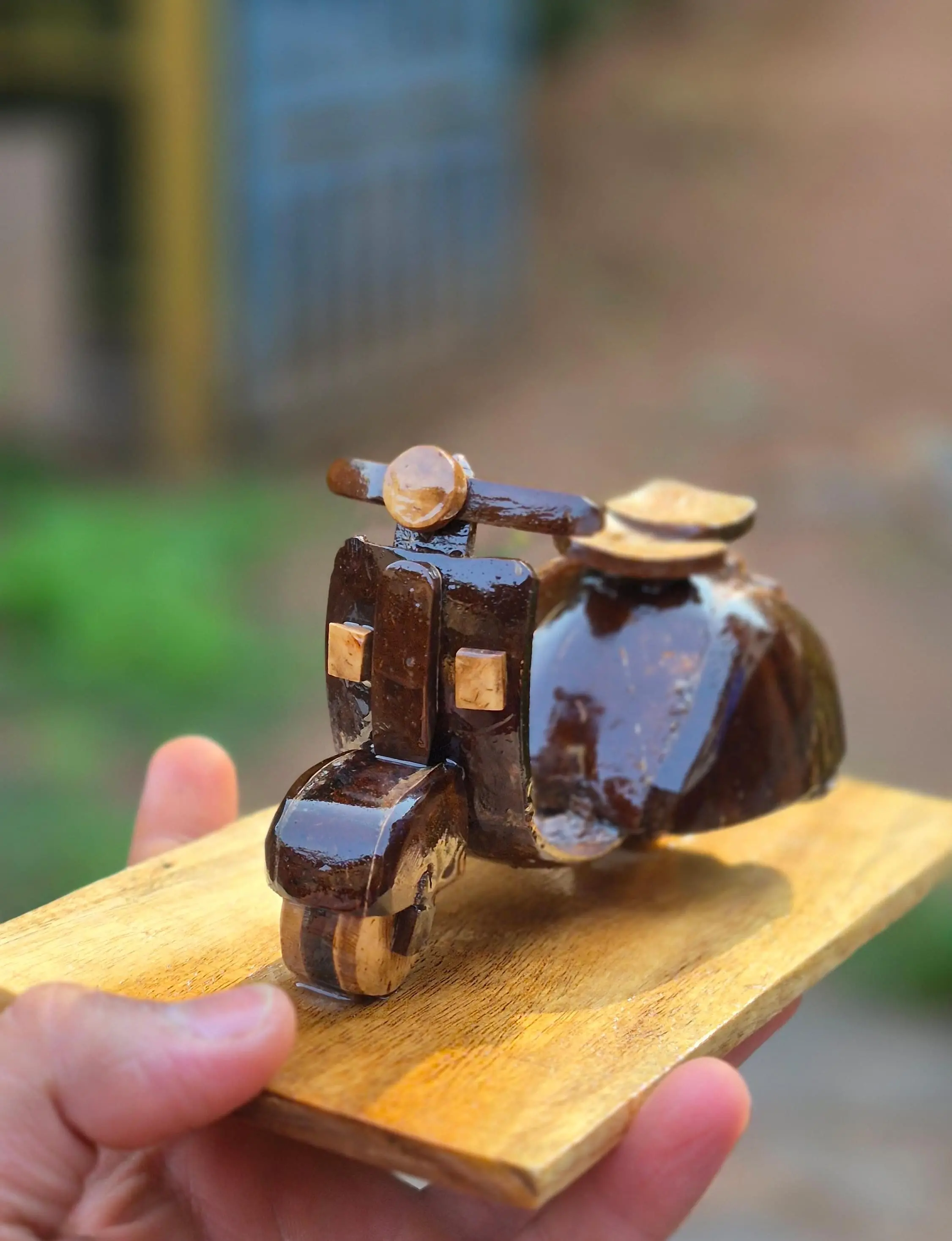 Hand-carved vintage scooter showpiece made from coconut shell and wood